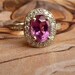 Pinky Purple Oval Sapphire and Diamond Halo Ring