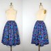 vintage . 1960s . swing . skirt . PASTORAL . violet . floral