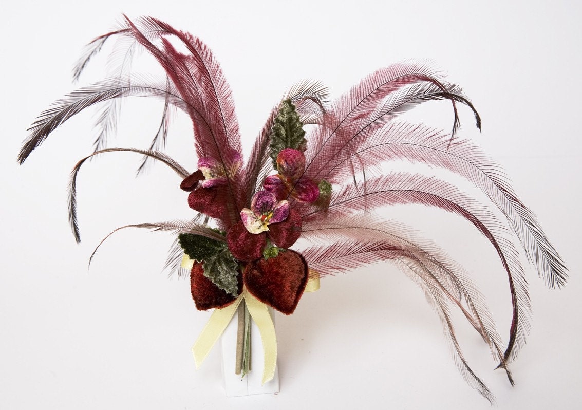 Fruit and feather clip by Samantha Sultana