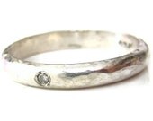 Sterling silver ring with diamond