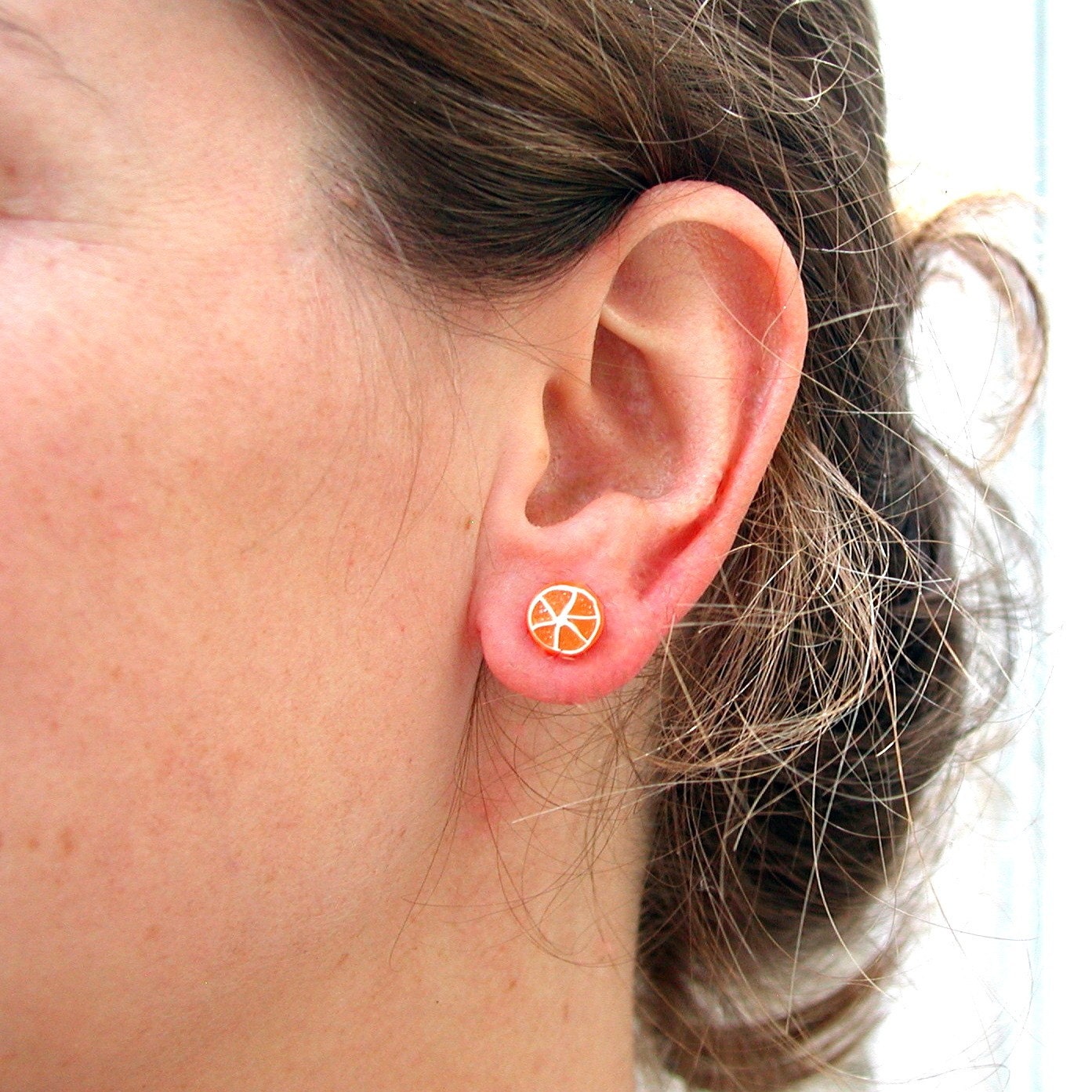 Orange half stud earrings