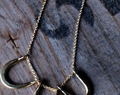 3 horseshoe necklace.