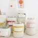 a 'high hopes' handy dandy woolly coated jar