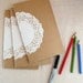 white lace doily -- screenprinted moleskine journal