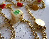 bohemian charm necklace - red coral beads, lucky dice, and golden charms - gypsy fortune necklace