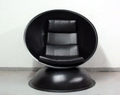 Orbit Lounge Chair Eames era Arrnio era Kartell