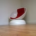 Orbit Lounge Chair Eames Aarnio Kartel Eras New classic design