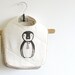 penguin baby bib made with organic cotton and flannel.