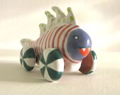 Striped Monster Fish on Wheels