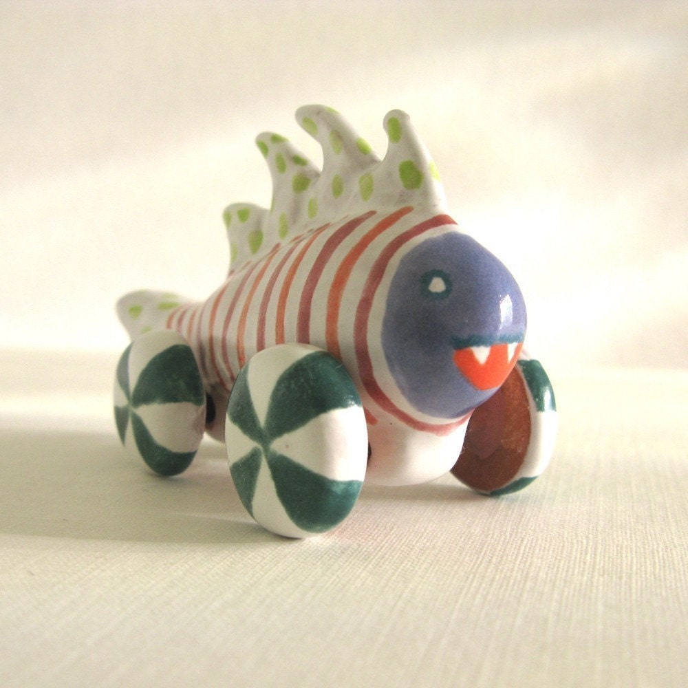 Striped Monster Fish on Wheels