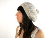 Penelope Snow and Ski PomPom Knit Slouch Hat in Oatmeal Alpaca Blend. Soft and Rustic. Spring and Winter Fashion Handmade in France.