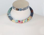 Bold statement choker in soft colors
