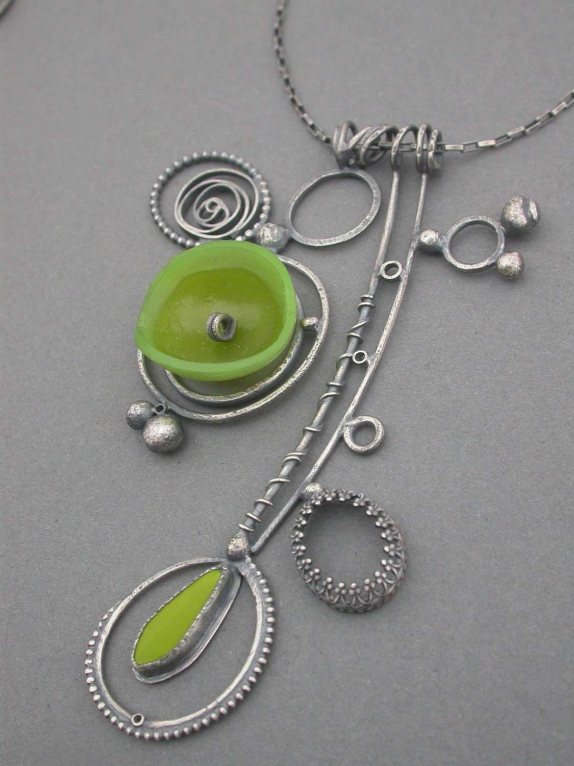 acid avocado green collage necklace art jewelry modern wearable art metalsmith found objects quirky funky jaime jo fisher