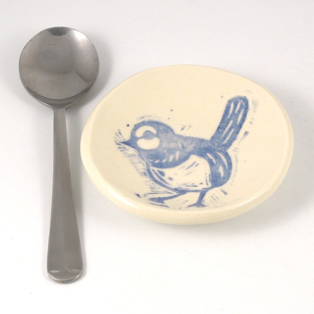 Tiny bird bowl in blue-ish purple.