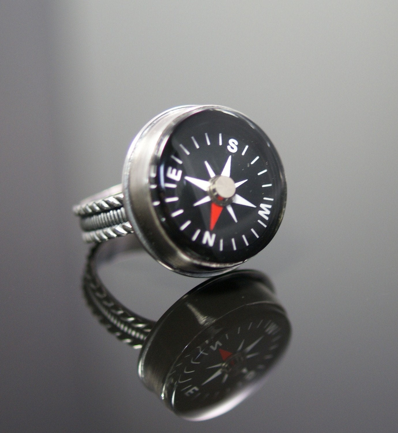 Lost or found your way made from Argentium silver and liquid compass