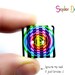 2 Handmade polymer clay buttons with stripes and psychedelic spiral