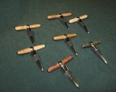 wooden corkscrew and bottle stopper