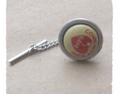 Vintage pinback tie tack reads I Gave