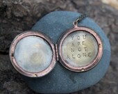 you are not alone . a (whispered) soul mantra locket