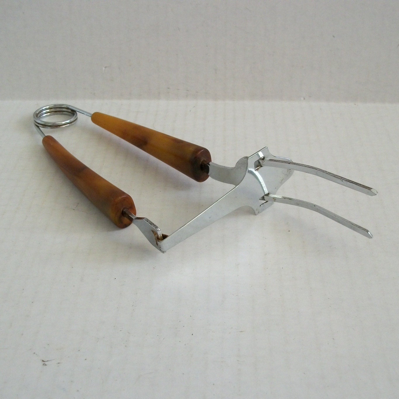 Vintage Meat Fork with Pusher Brown Plastic by DandelionGirl