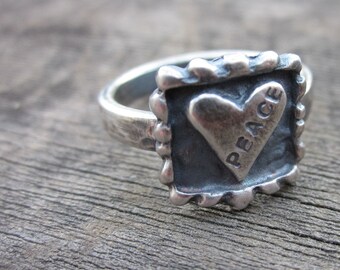 Love Peace Hand Stamped Ring by donnaodesigns