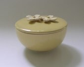 Ceramic Lidded Vessel with Dogwood Flower in Yellow