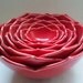 Eight Nesting Lotus Ceramic Bowls in Red