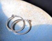 ULTRA MINI 1/2 inch solid 18k white gold forged plain hoop earrings -- just around the lobe.perfect for sensitive piercings and children