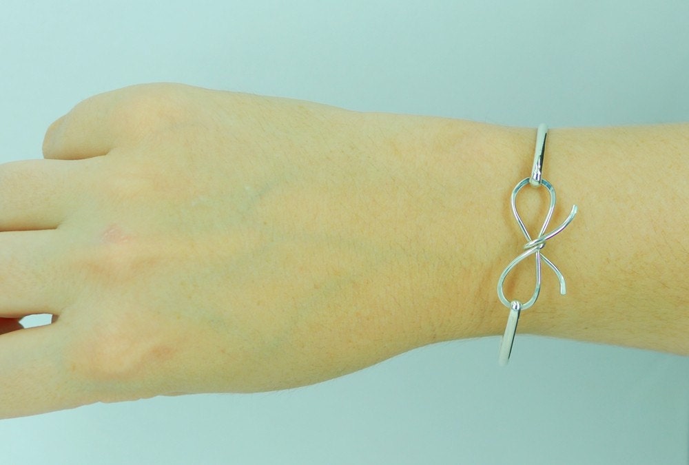 Forget me knot bow sterling silver bangle