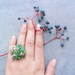 Silver Butterflies and Green Grass Ring