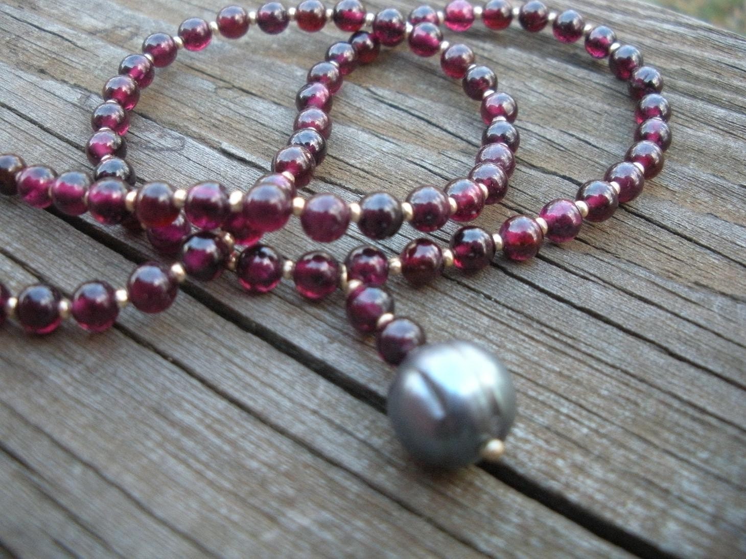 Garnet necklace with freshwater peackock pearl pendant
