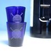 2 Shot Glasses - Yarn - round blue and clear square etched glasses