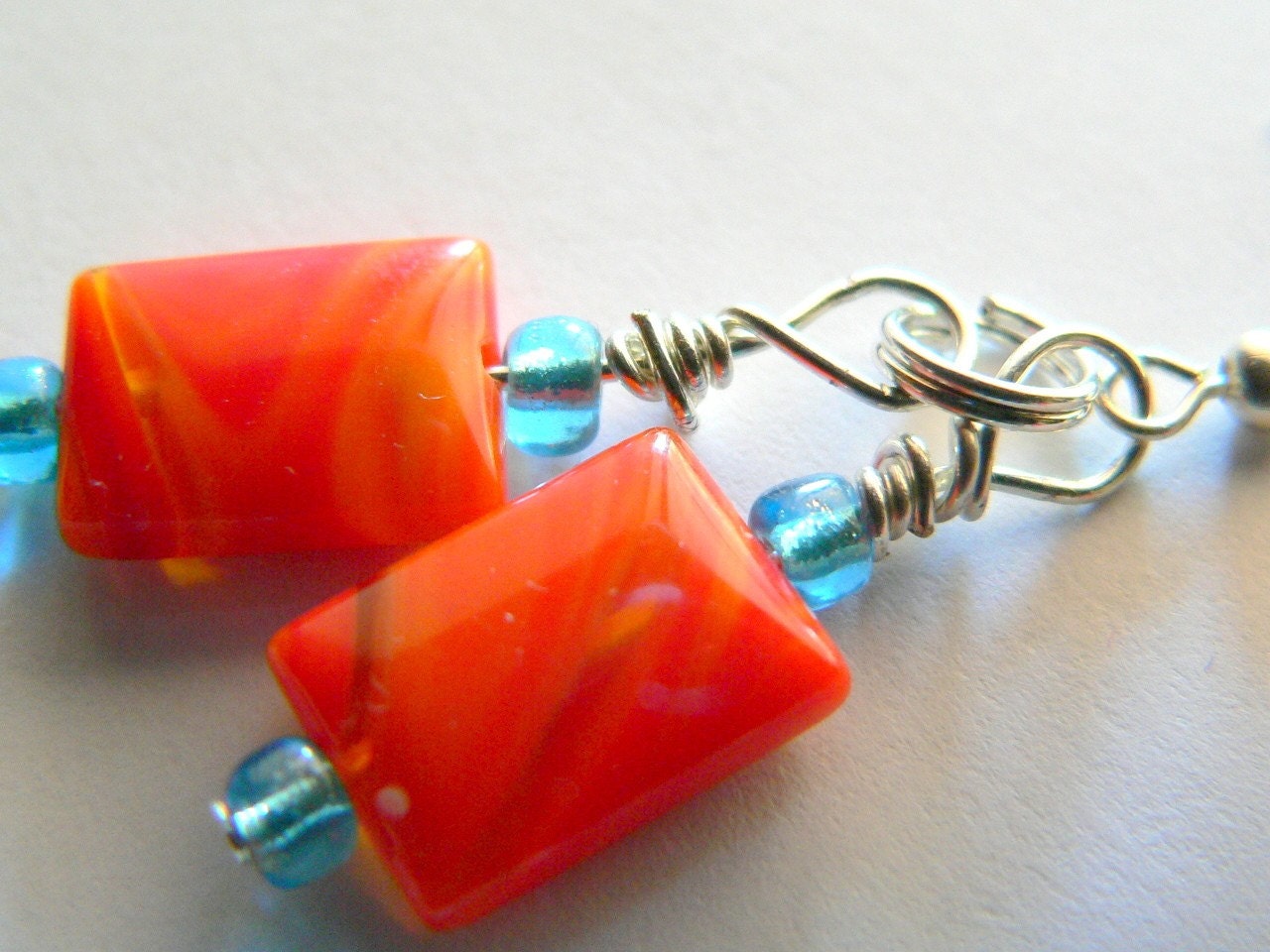 Arizona Sunset... Orange Lamp work Swirl glass beaded Earrings..clearance weekend deal 50 percent off