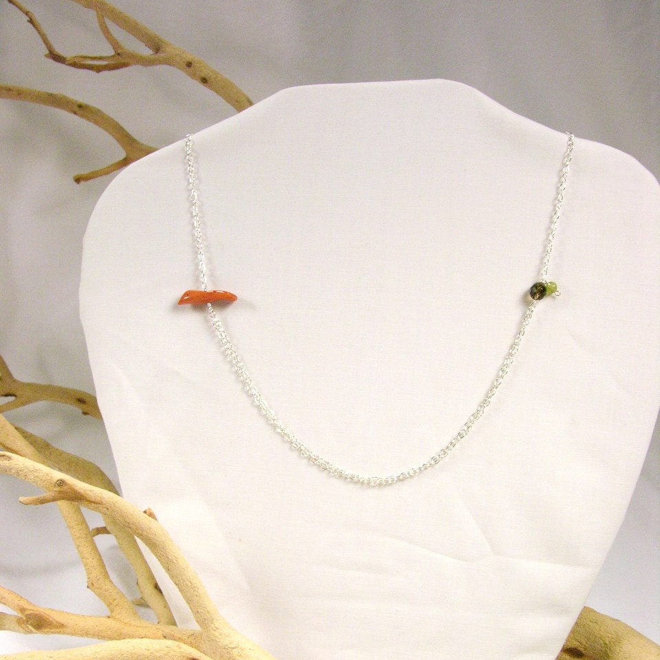 asymmetrical carved coral bird charm necklace