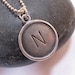 Rustic rimmed sterling silver disc necklace