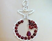 Open Pomegranate I (Rimon) sterling silver and garnet pendant.