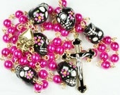 Muertos Skull Rosary in Gold with Sugar Skulls and Pink Glass Pearls