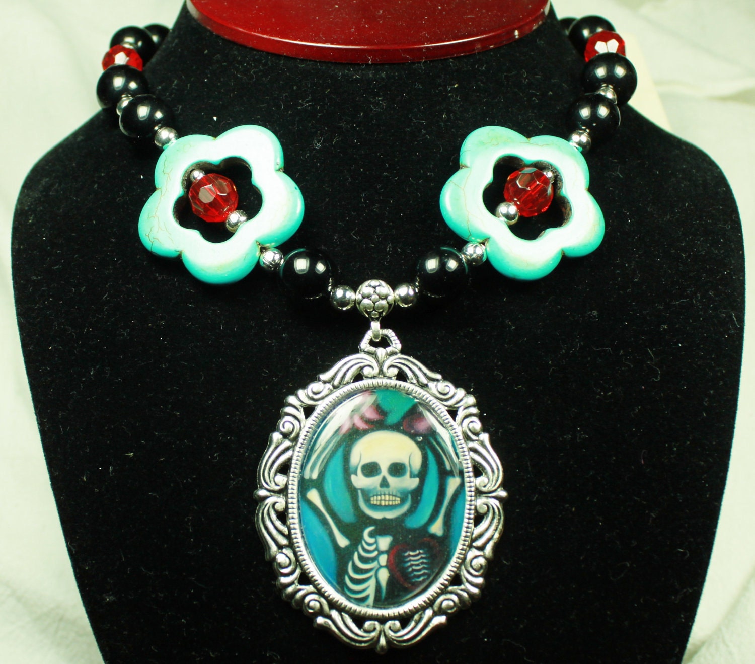 Unrequited Love Art Necklace with Blue Stone Flowers, and Black and Red Glass