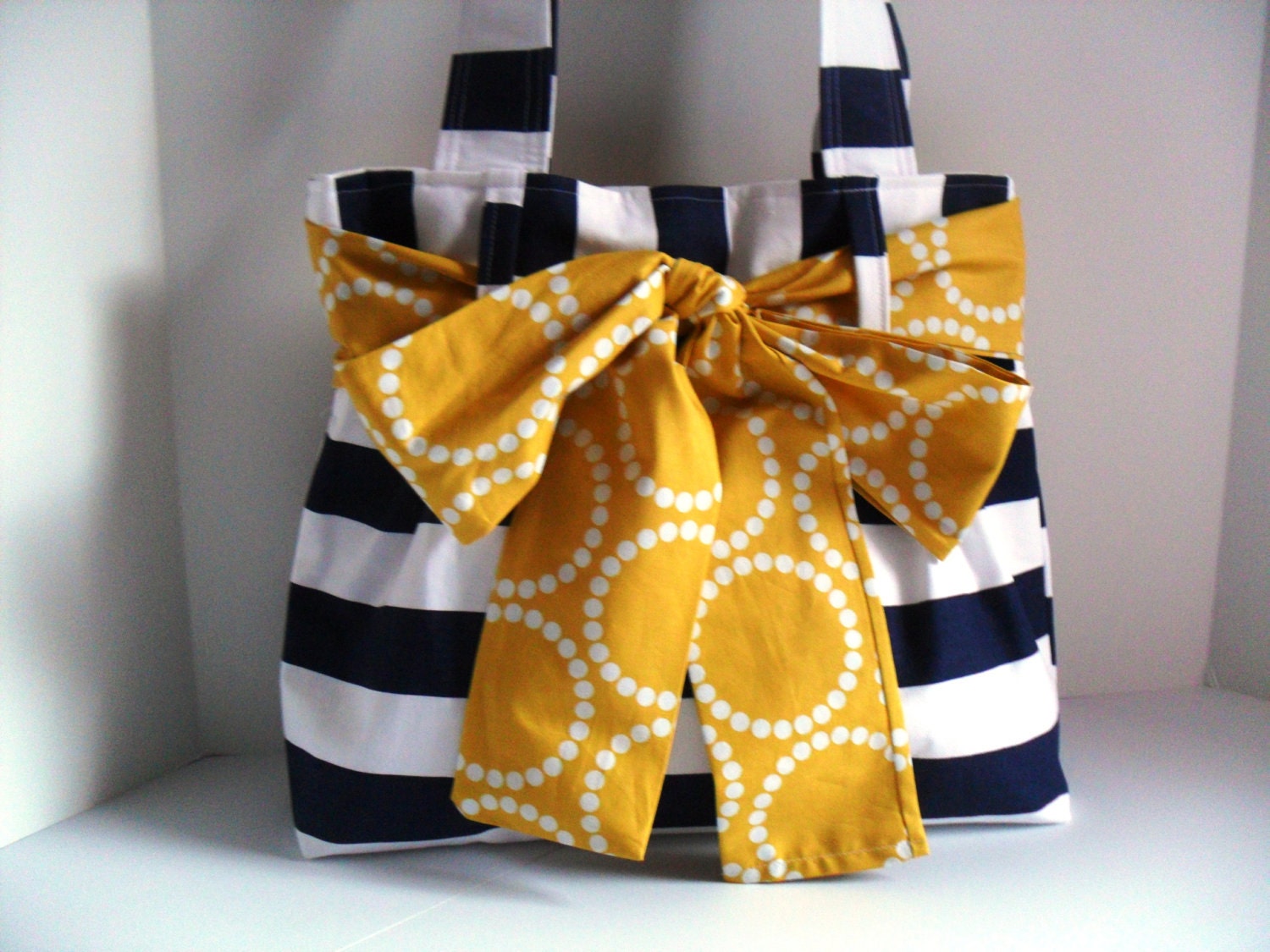 Medium Handbag Made of Navy Blue and White Stripe  Fabric with Yellow  Bow