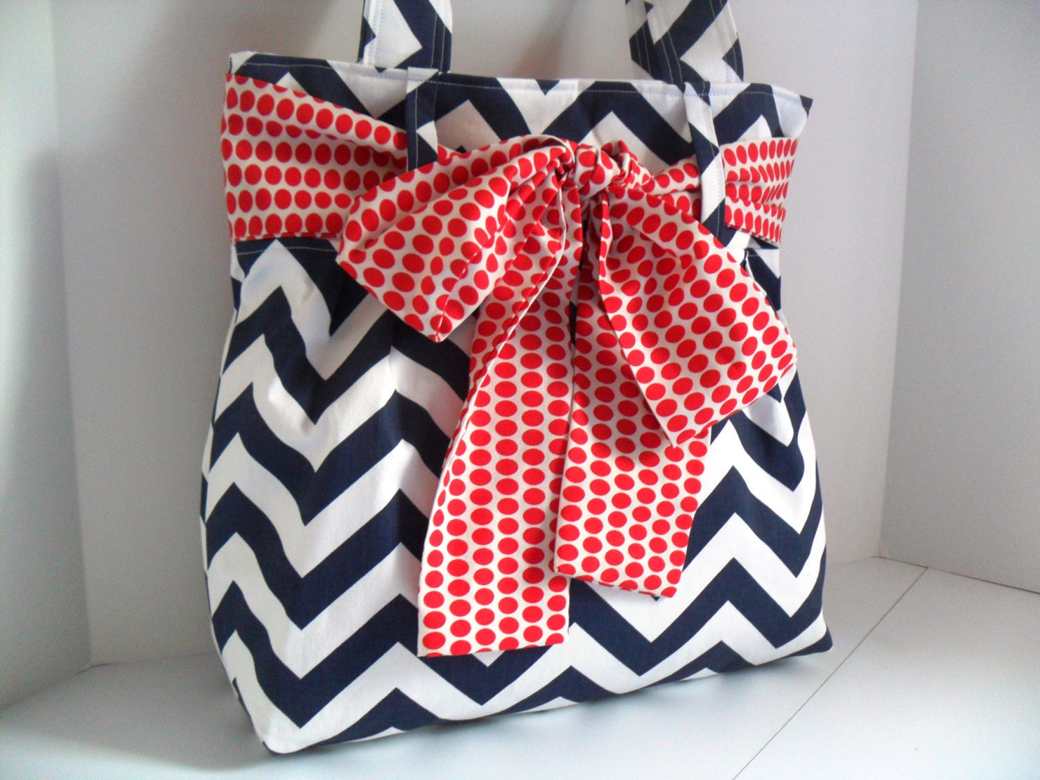 Handbag Made of Blue and White Chevron Fabric and Large Red Bow