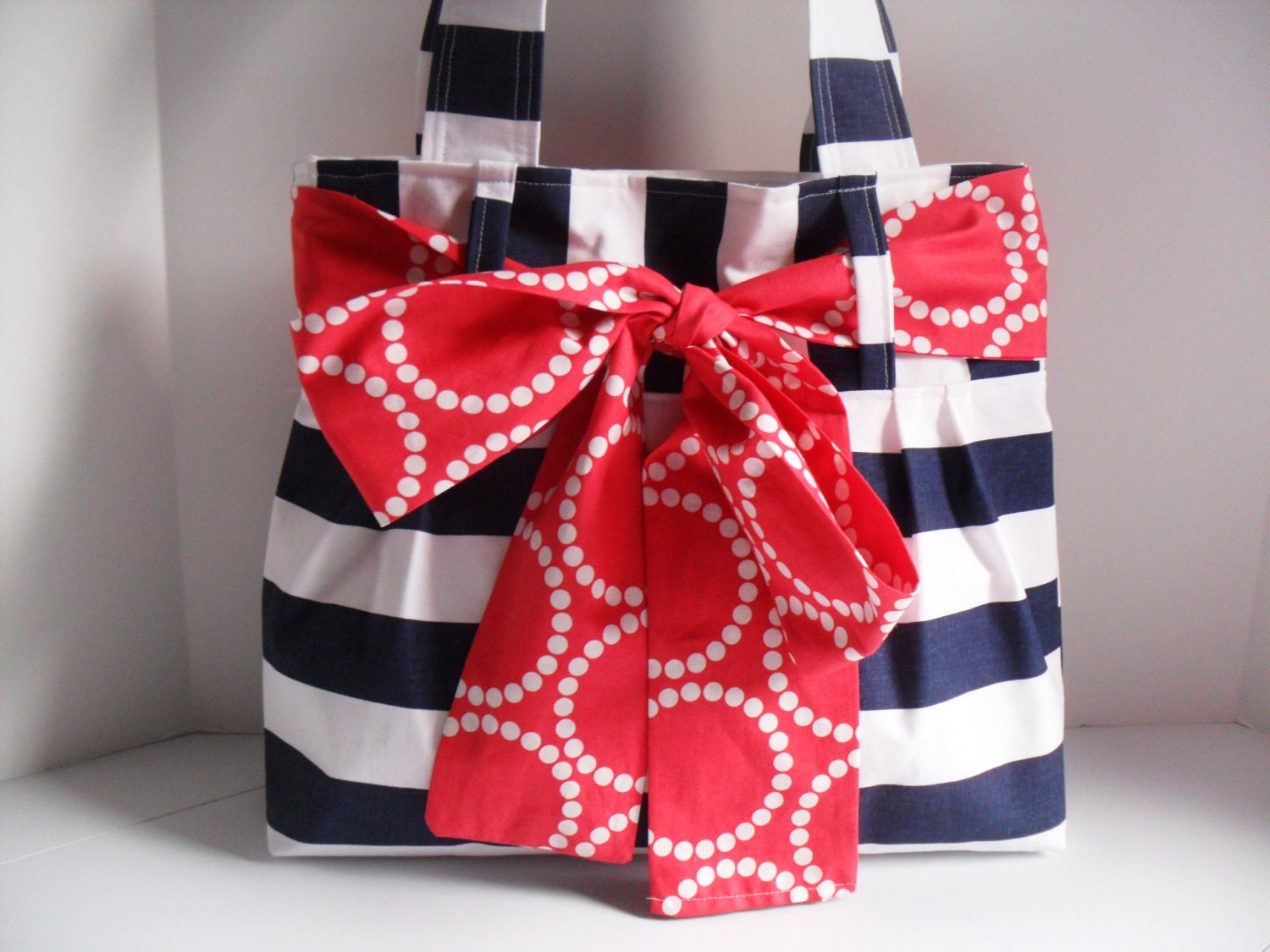 Medium Handbag Made of Navy Blue and White Stripe Fabric with Red Bow