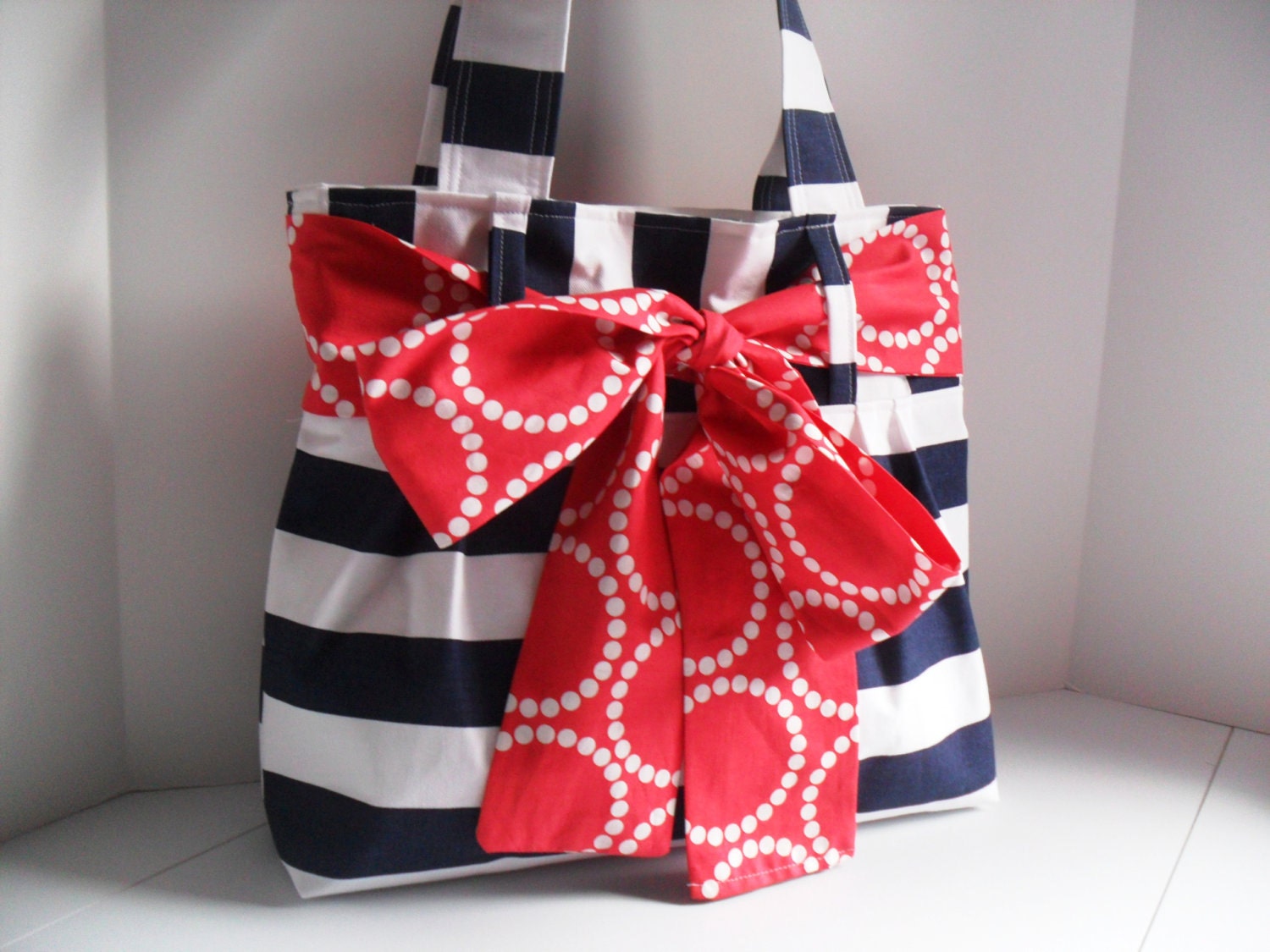 Medium Handbag Made of Navy Blue and White Stripe Fabric with Red Bow