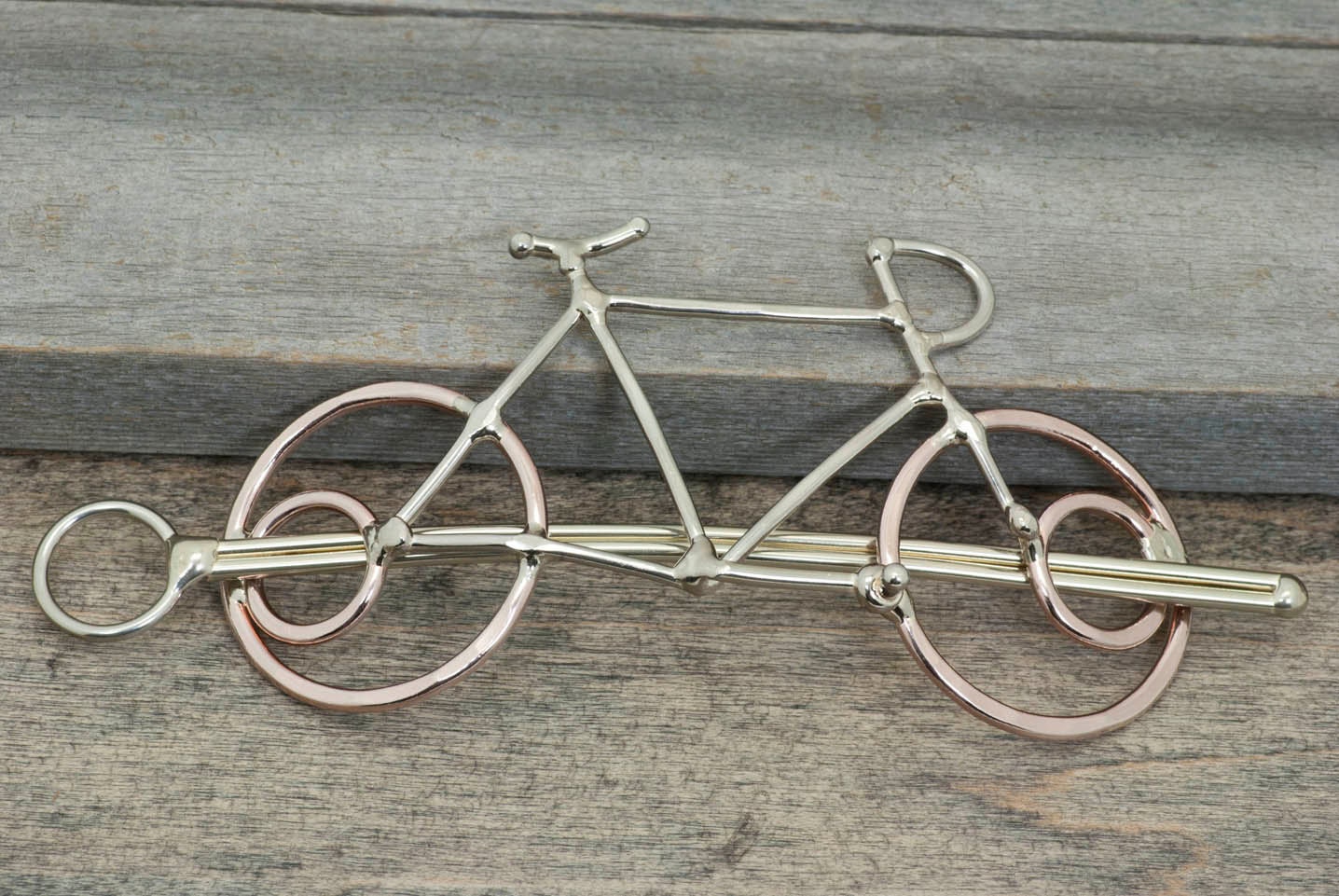 Bicycle hair slide or bike hair barrette also used as shawl pin or scarf pin
