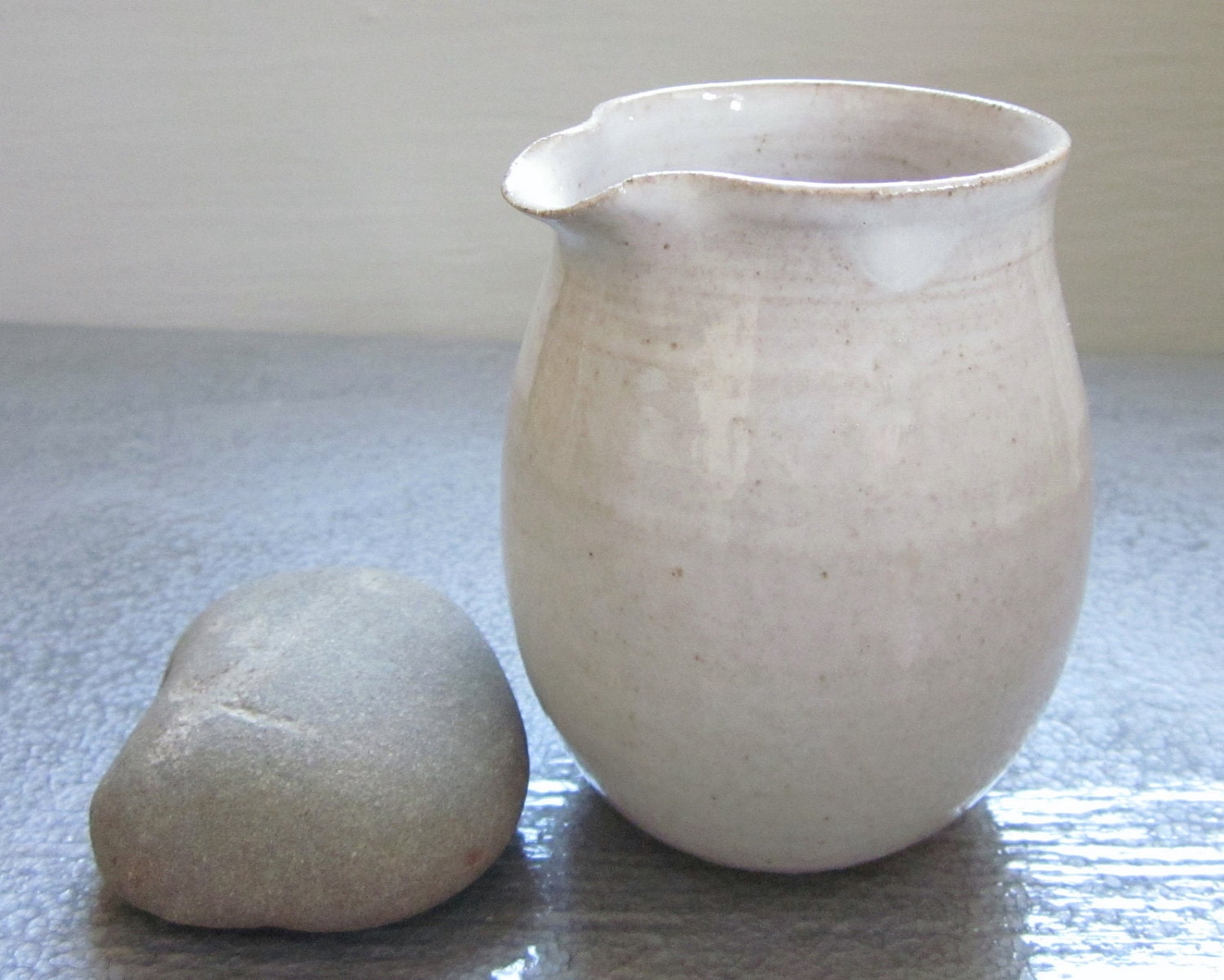 minimalist handleless white creamer or syrup pitcher - 4  inches tall