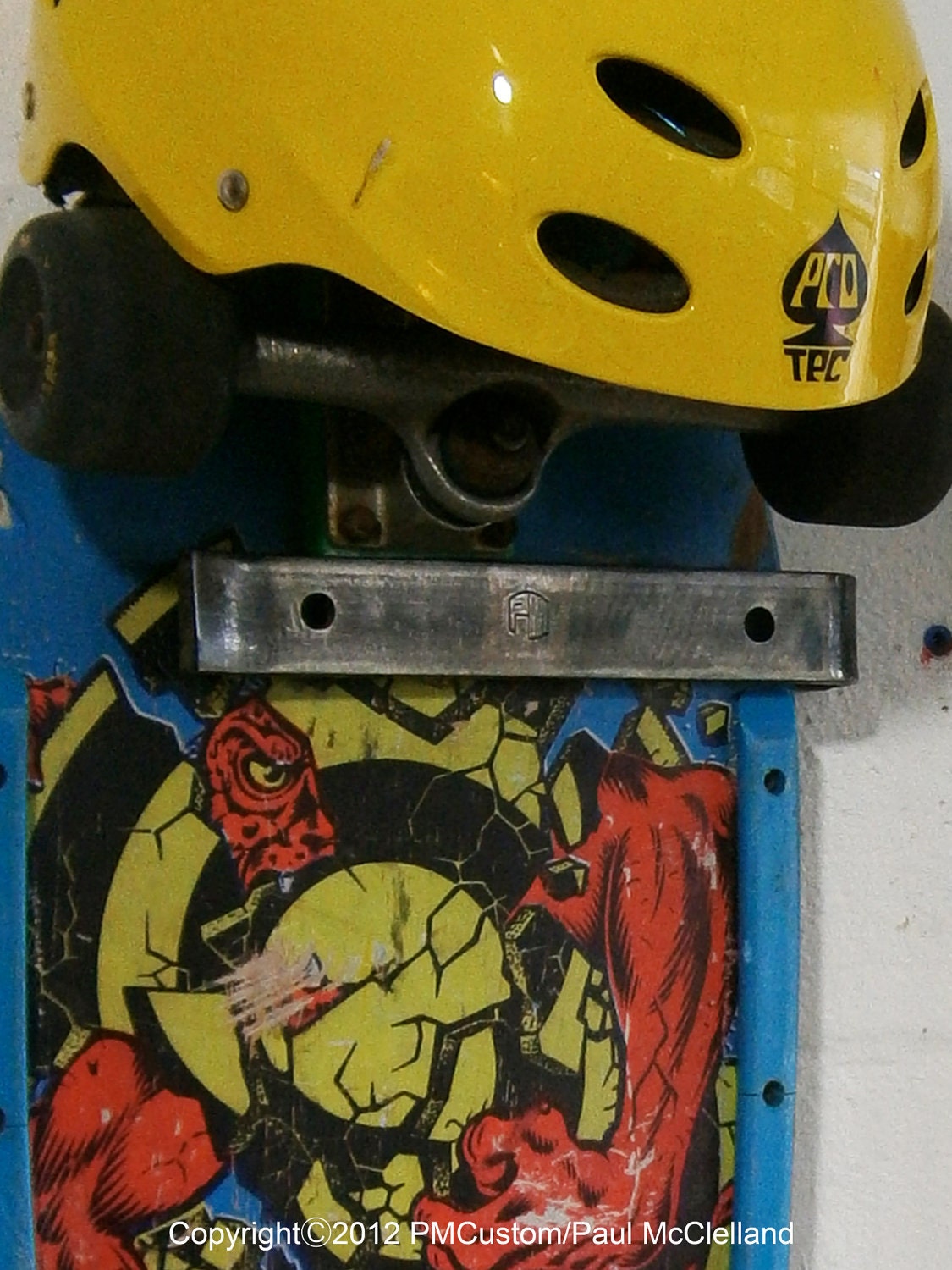 Lip Hanger clear lacquered acid etched steel skateboard rack