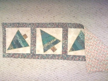 Table runner accented with Four Tipsy Trees
