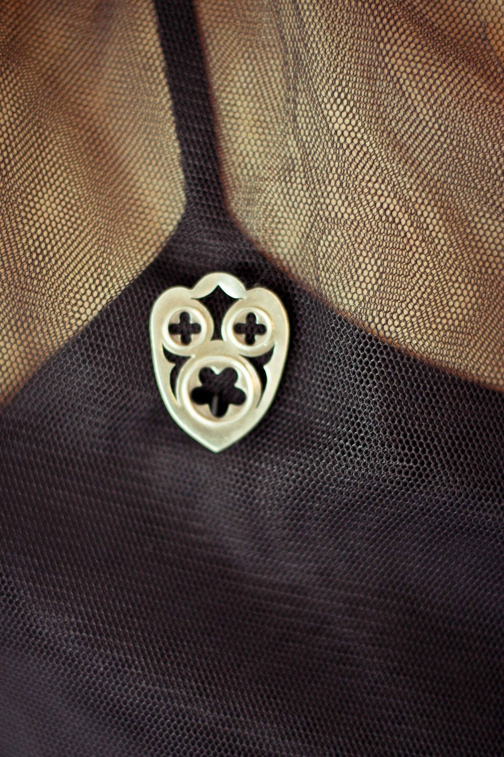 Quatre Cinq - silver brooch inspired by medieval cathedral windows