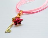 Free shipping. Romantic Hot Pink lucite Flower Key Skeleton Pendant Necklace