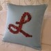 Personalized Pillow with Red Button Monogram -- by Letter Perfect Designs