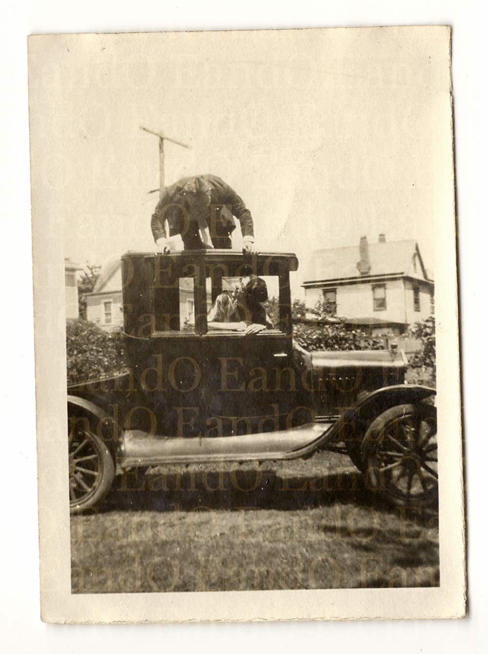 Antique Unusual Snapshot of a Man Horsing around Climbing on top of a Ford Model T Runabout Car 1920s